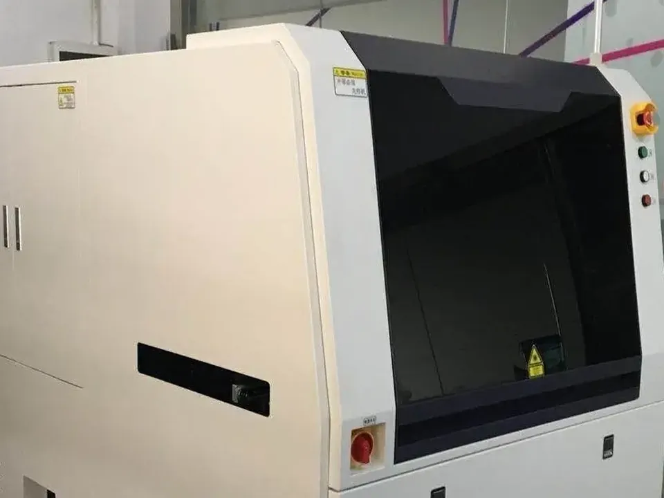 Automated optical inspection machine scanning a circuit board