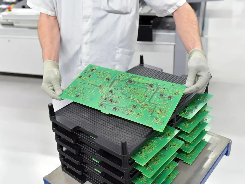 Bare boards being handled between fabrication steps