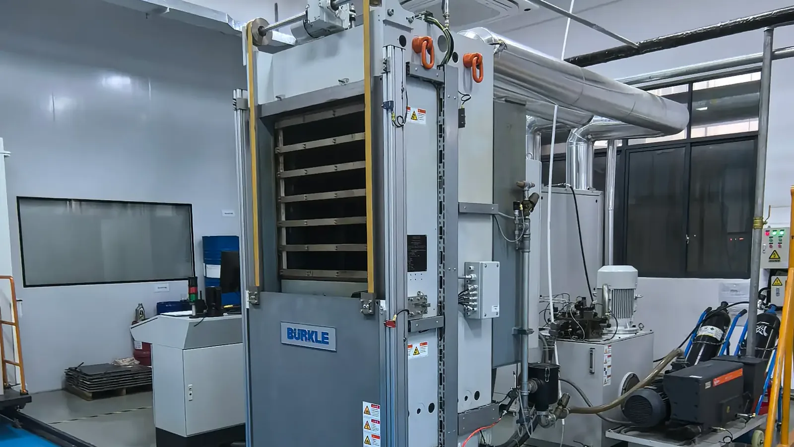 Multilayer lamination press used to bond PCB stack-ups